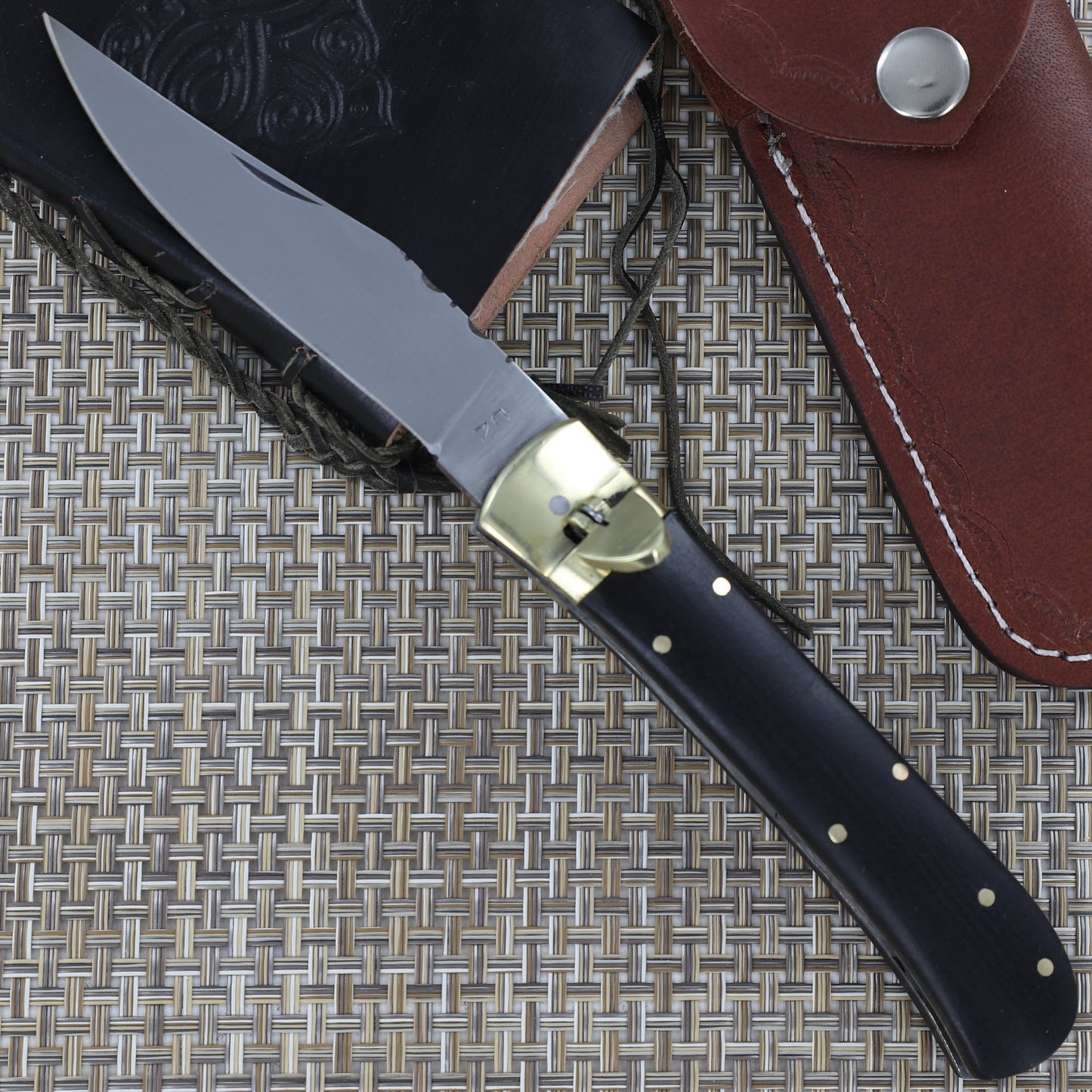 Obsidian Resonating Clip Point Automatic Lever Lock Knife